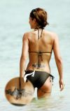 cheryl cole lower back tattoo